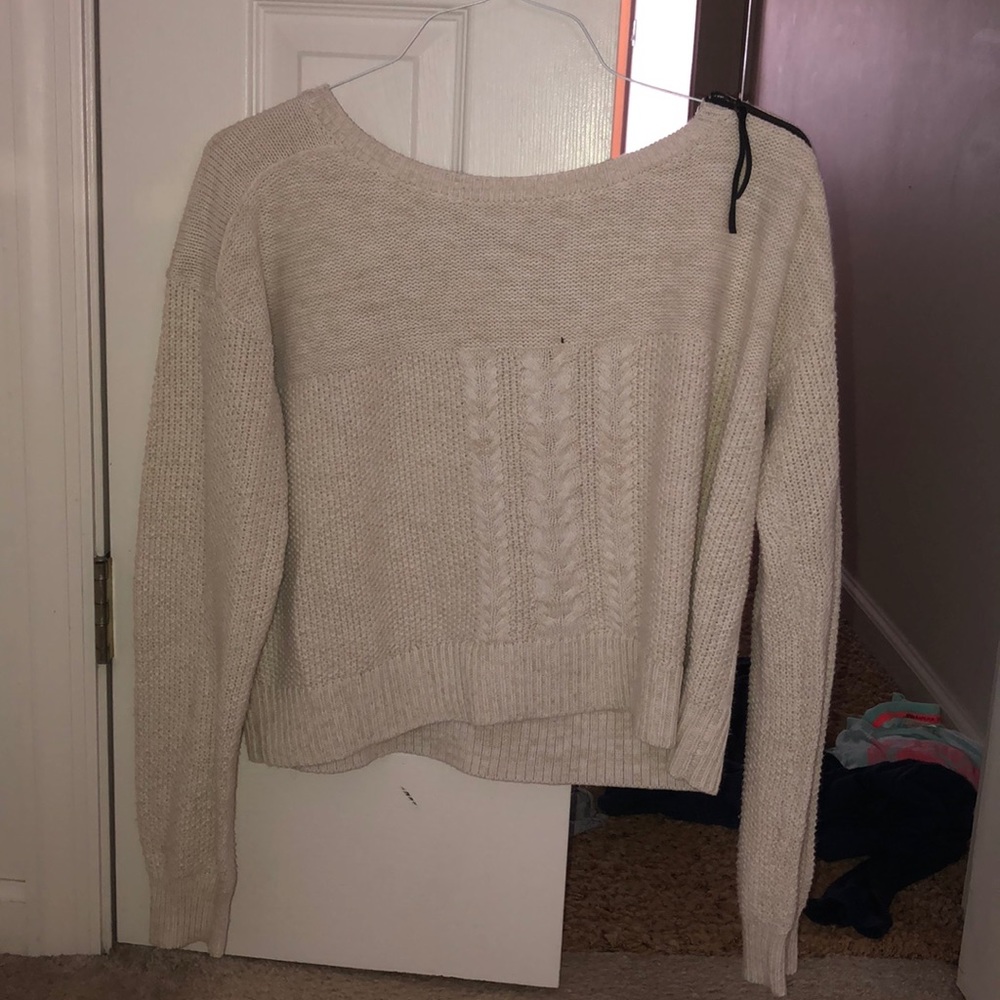 Cream knit sweater with side arm zipper